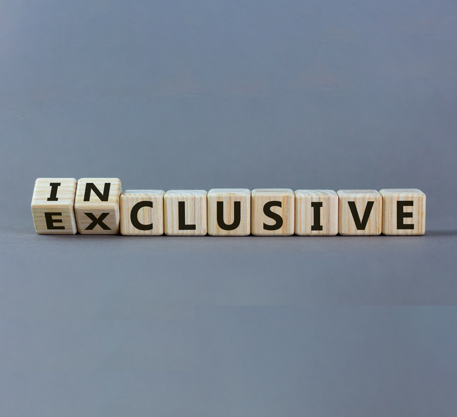 Cubes spelling out the word exclusive changing to inclusive