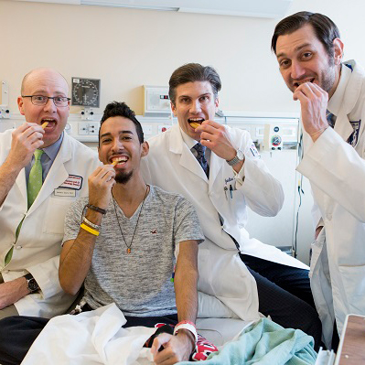 Joel Rodriguez and his treatment team Jeremy Davis, Joel Rodriguez, Jonathan Hernandez and Adam Cerise celebrate Joel’s successful surgery with burgers and fries.