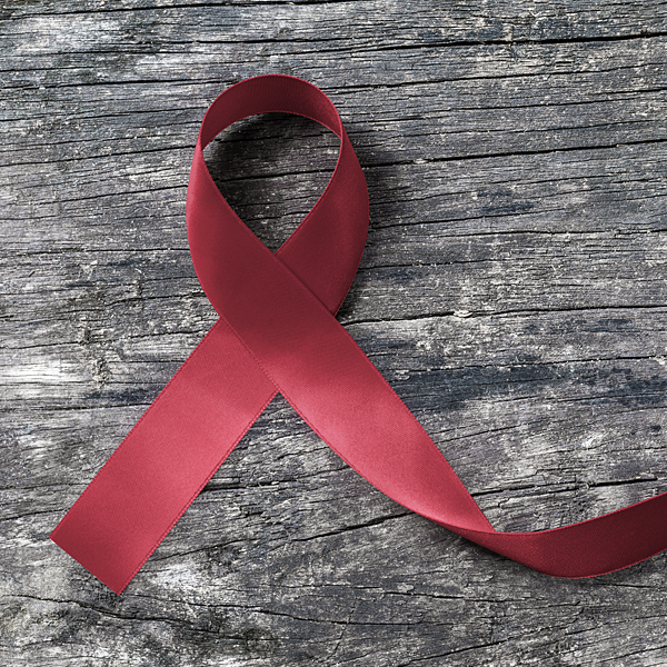 A red awareness ribbon for sickle cell disease