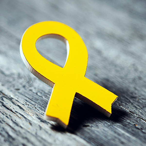 A yellow endometriosis awareness ribbon