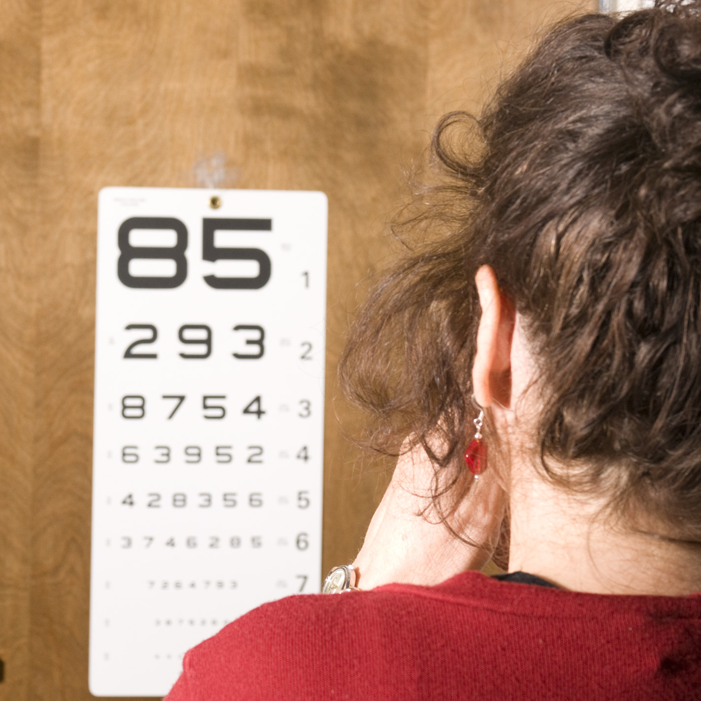 Image of a patient reading an eye chart.
