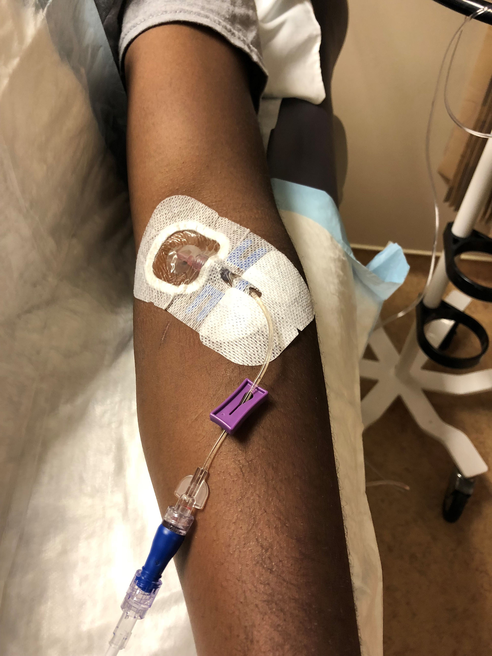 Image of volunteer receiving IV infusion Image of volunteer receiving IV infusion