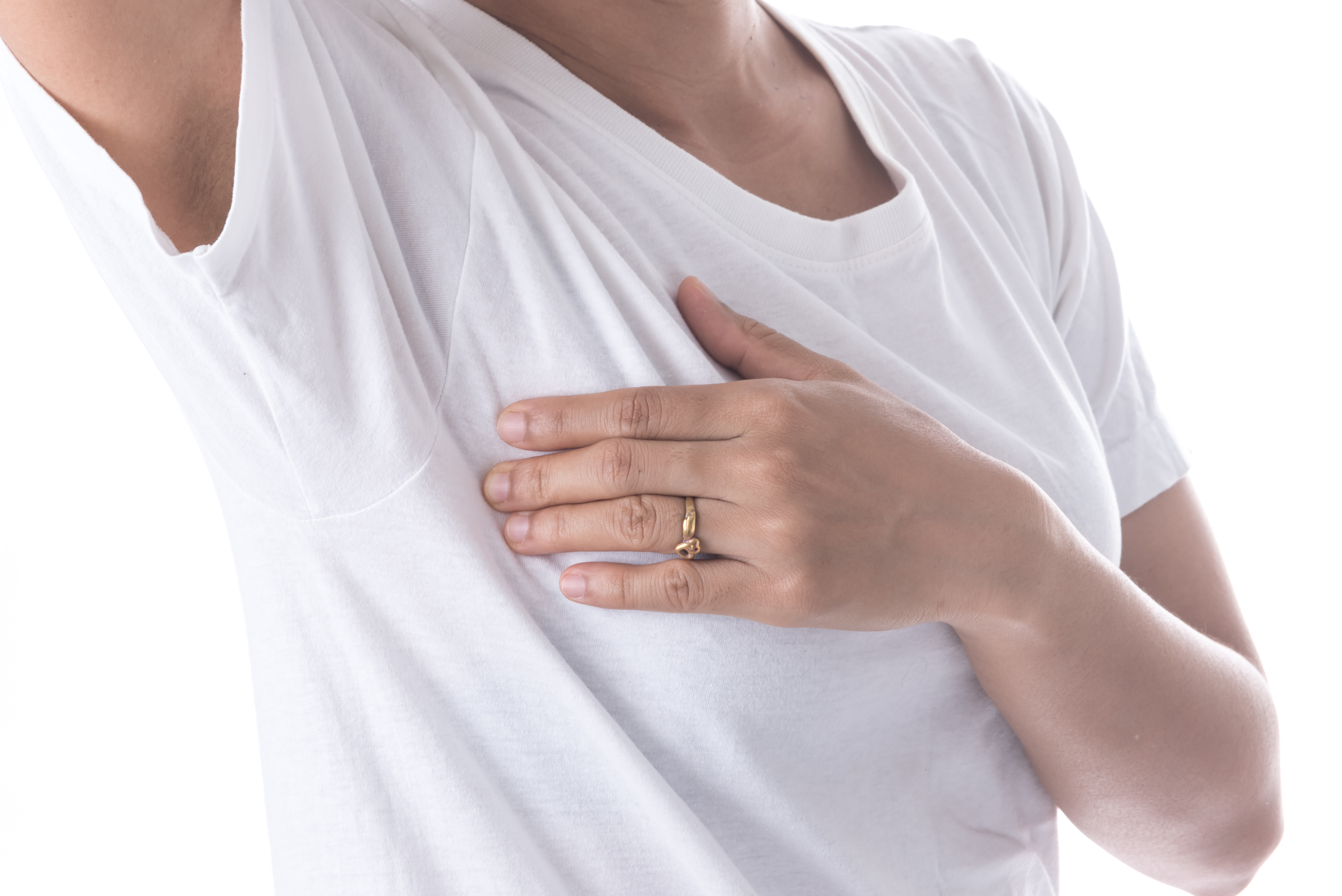 Image of a woman holding up her arm.