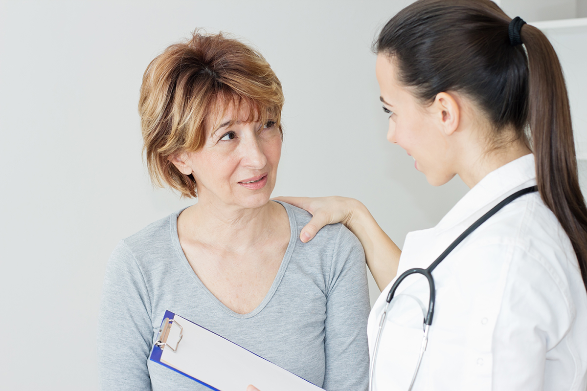 image of a woman and her doctor