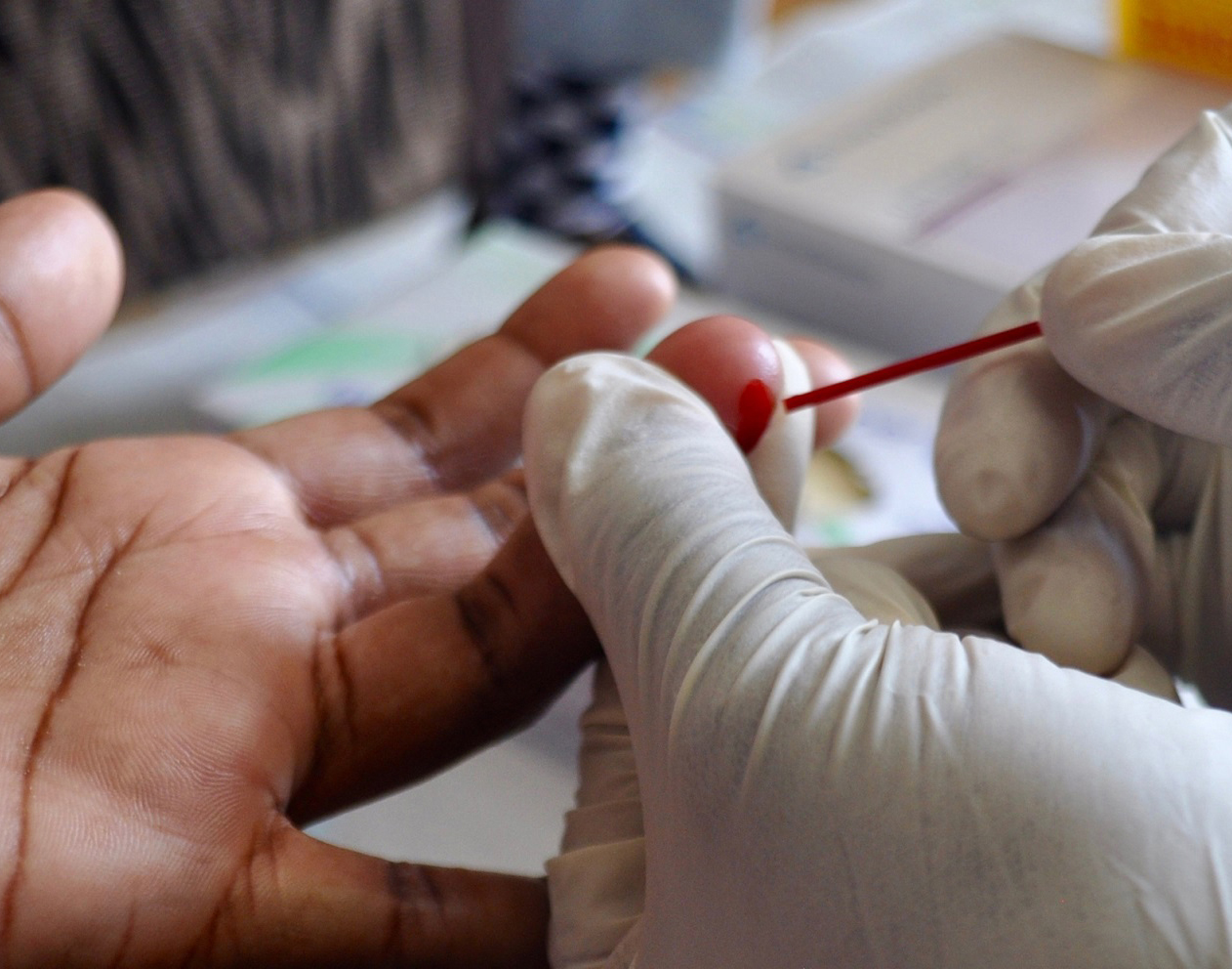 Image of blood being captured in a capillary tube 