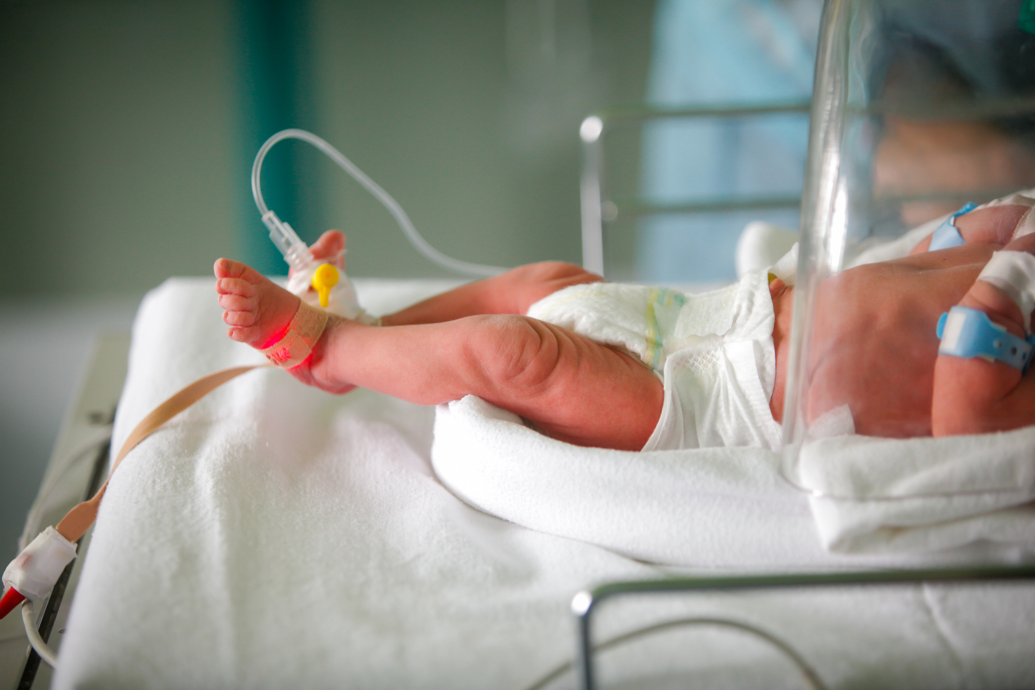 An infants foot in the hospital.