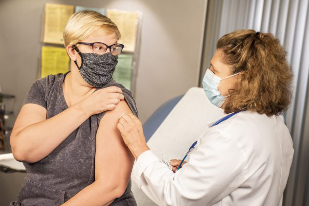 Image of a healthcare worker and patient