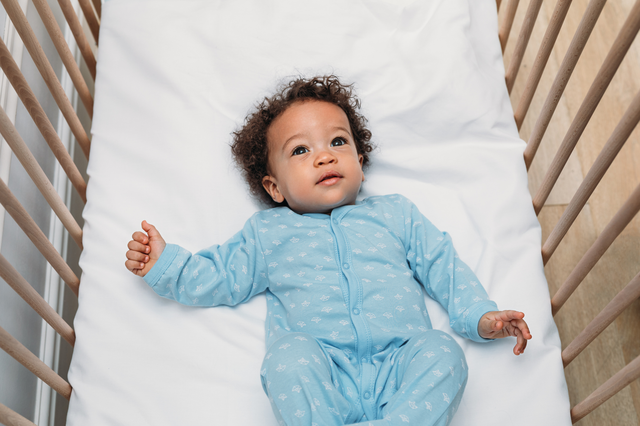 Portrait of a cute baby boy wearing pajamas - stock photo
