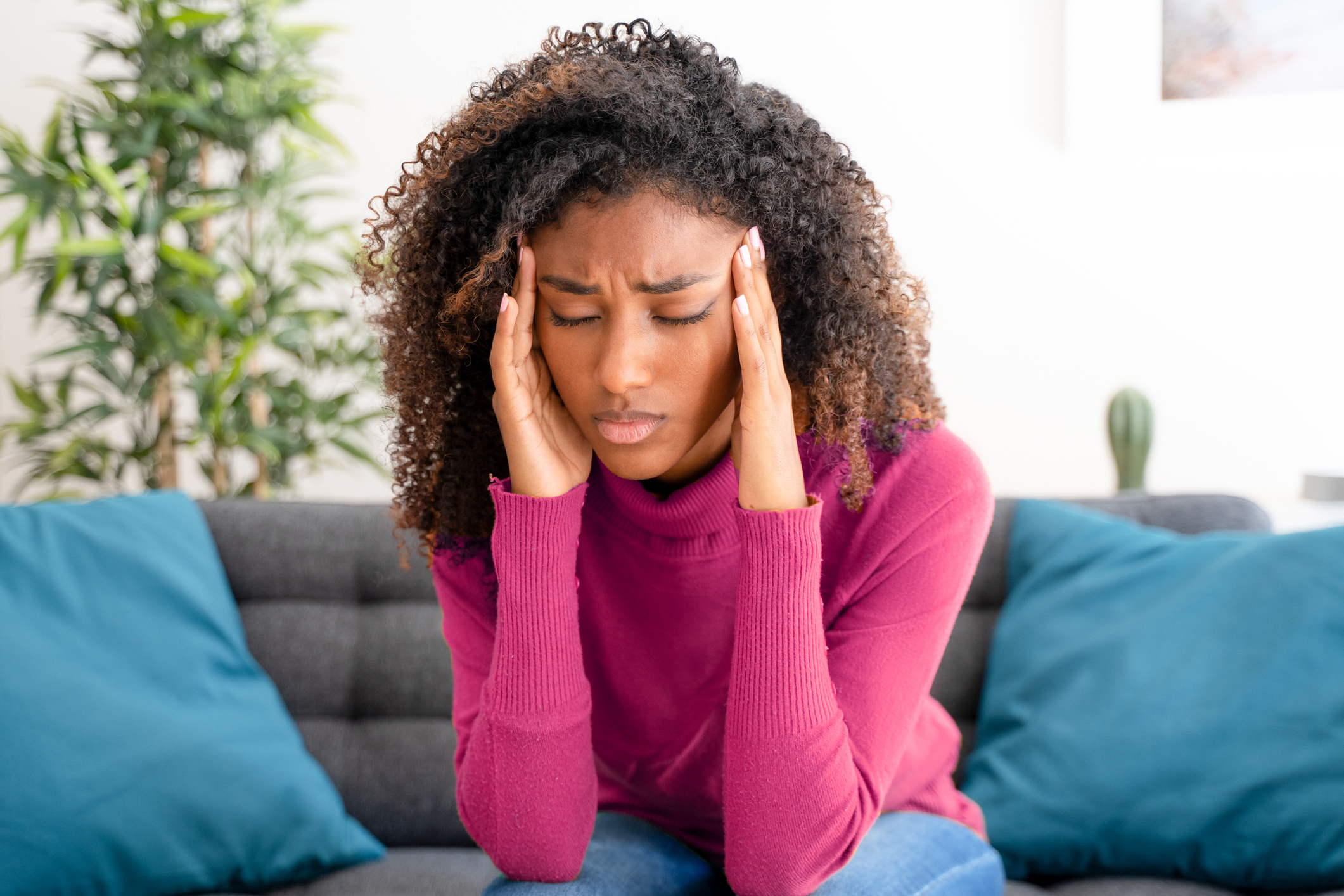 Young black woman suffering bad and strong headache - stock photo