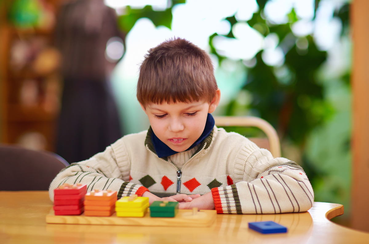 A child playing with blocks.