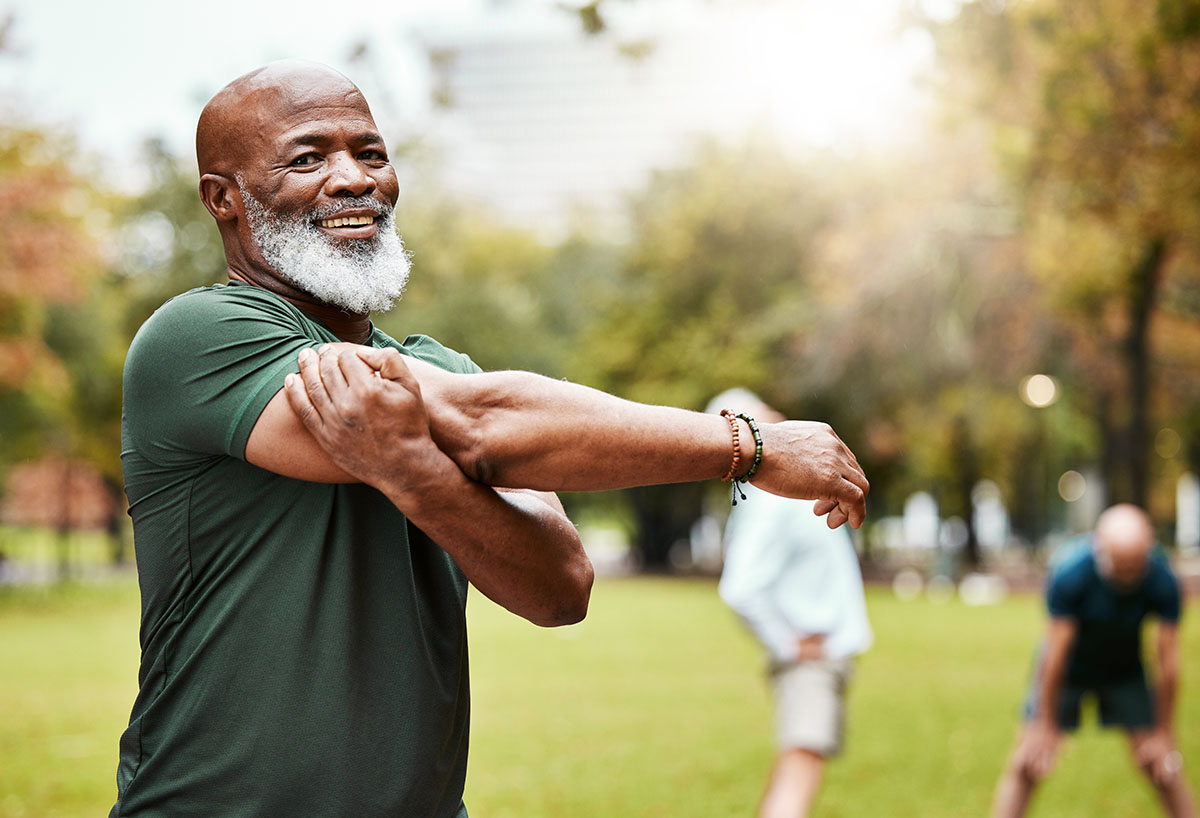 Portrait, stretching and active seniors at a park for training, exercise and cardio wellness. Fitness, arm stretch and friends with senior men relax before workout, happy and together for activity Portrait, stretching and active seniors at a park for training, exercise and cardio wellness. Fitness, arm stretch and friends with senior men relax before workout, happy and together for activity