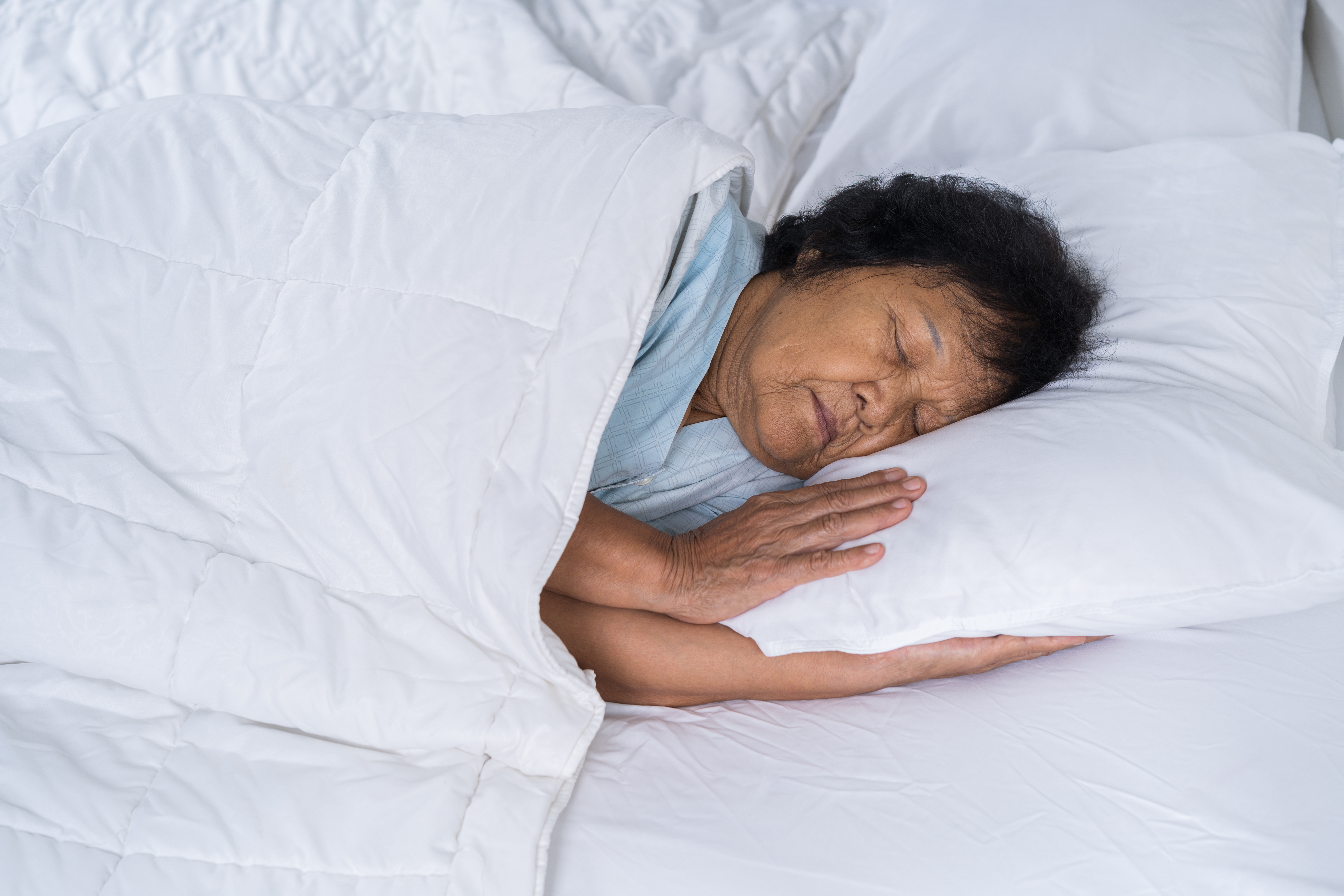 Image of an older woman sleeping
