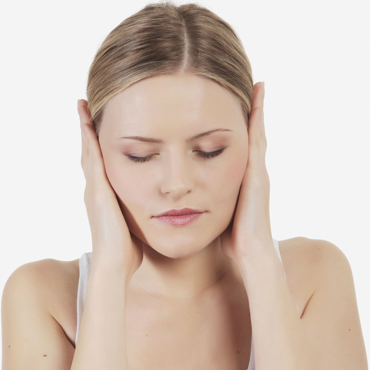 Photo of a young woman holding her ears with concern thumbnail