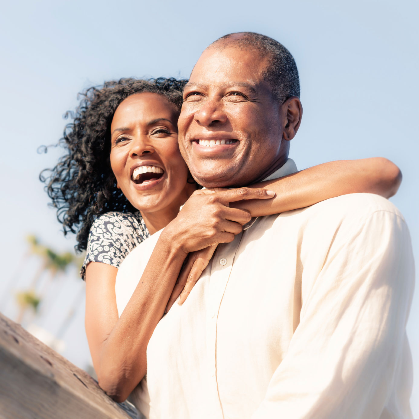 Happy mature couple looking at view.