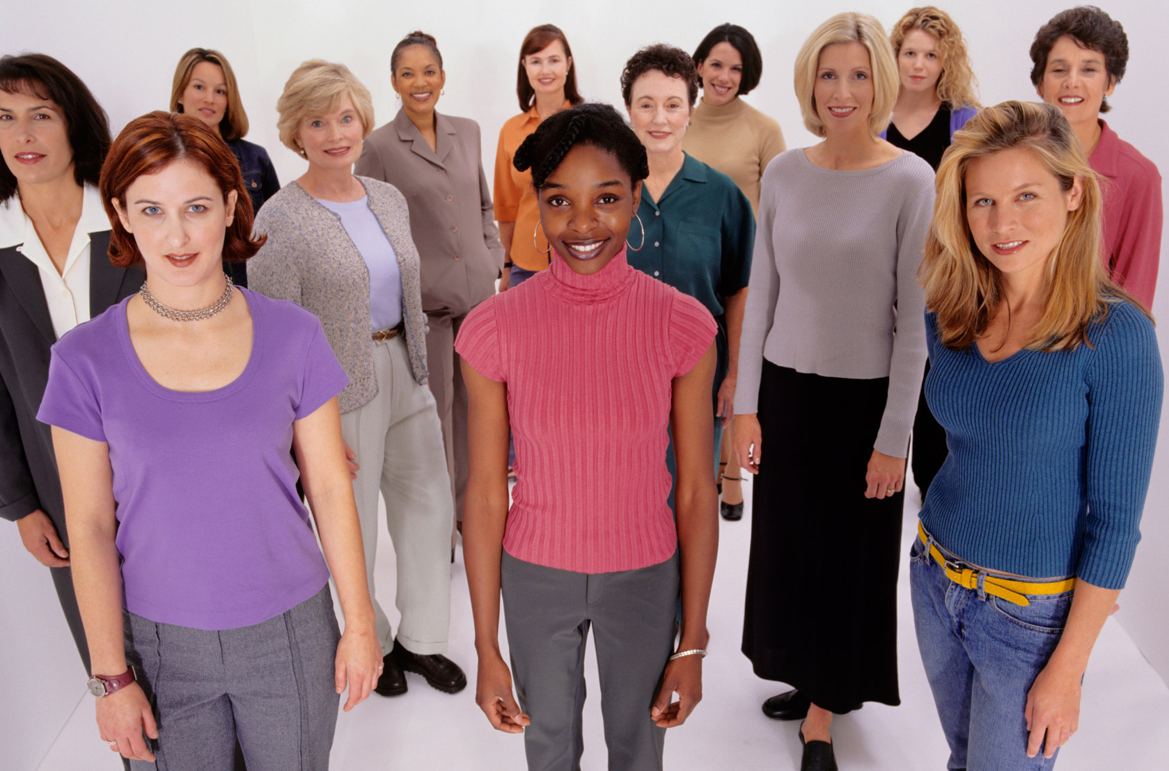 Large group of women standing side by side Large group of women standing side by side.