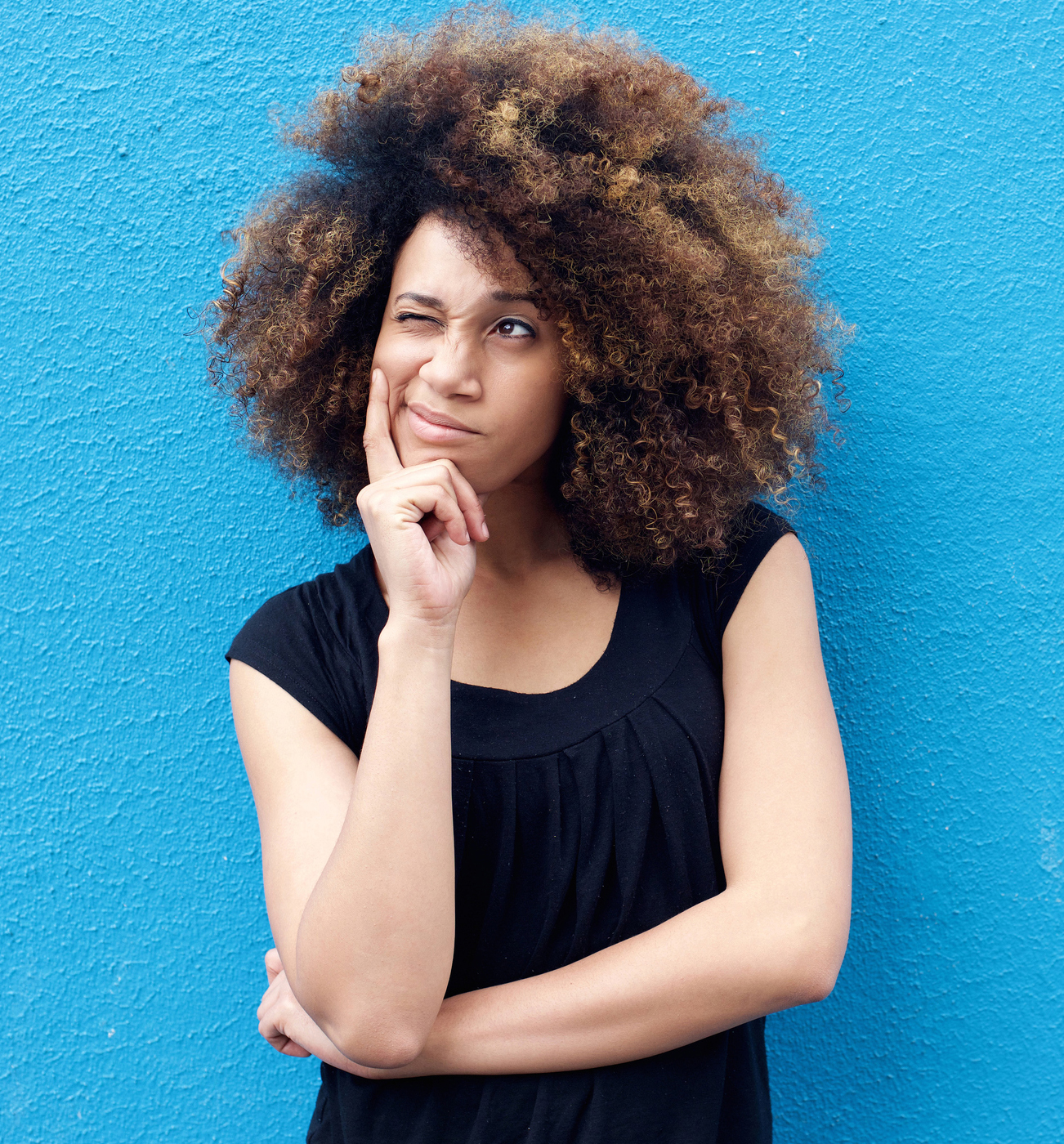 Young woman thinking.