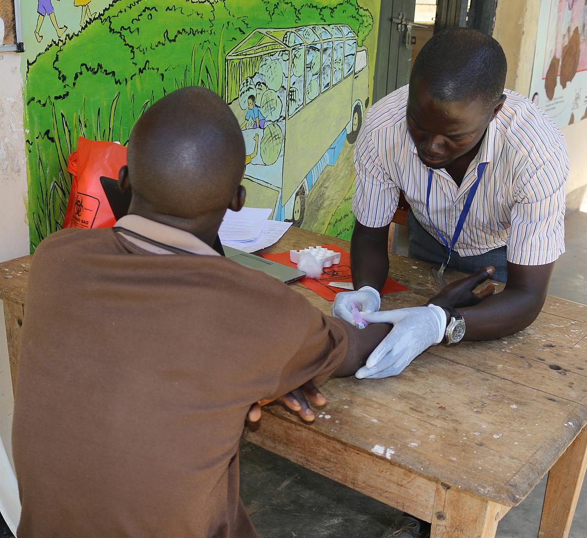 Drawing blood from a study participant Drawing blood from a study participant