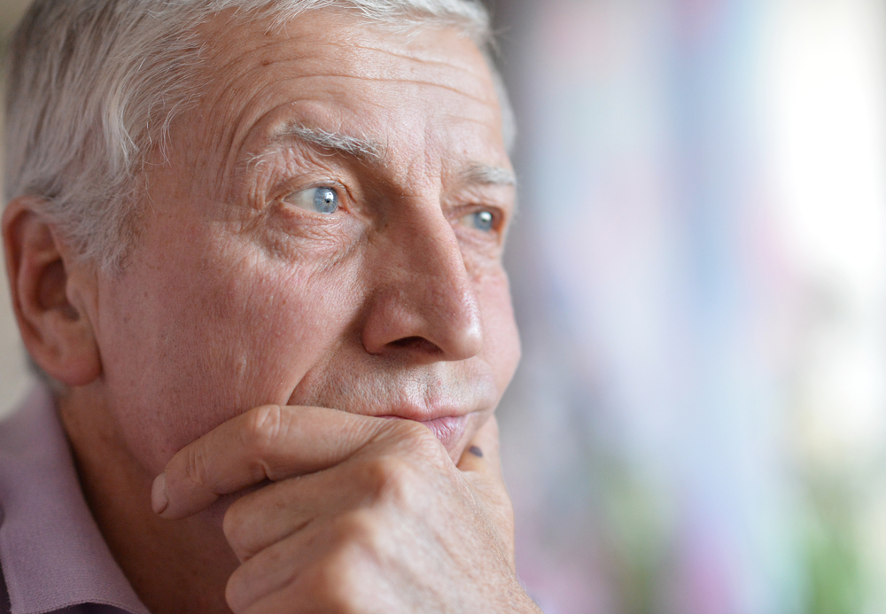 Portrait of an older man deep in thought