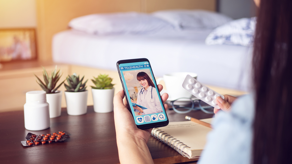 Mobile phone being used for telehealth visit Mobile phone being used for telehealth visit