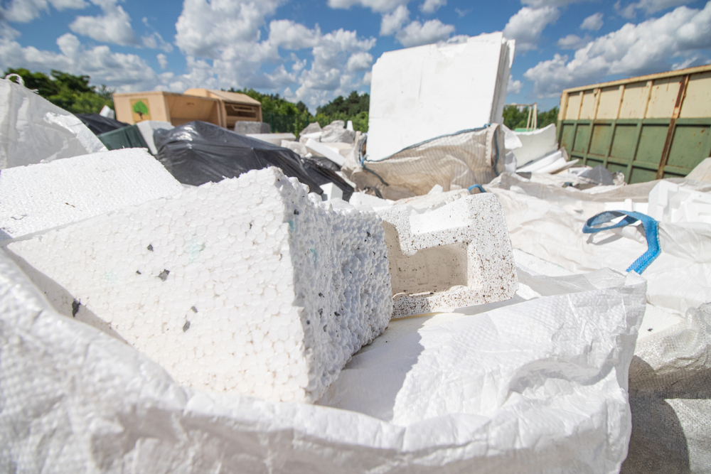 Pile of used polystyrene packing material at waste dump. Pile of used polystyrene packing material at waste dump.