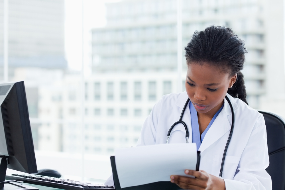 Doctor writing a prescription Doctor writing a prescription