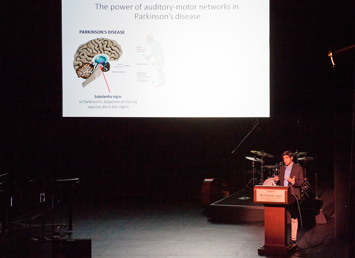 Dr. Aniruddh Patel speaking at the Kennedy Center