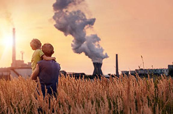 Son and father with pollution emitting building in background