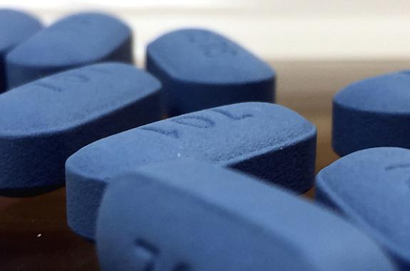 Close up of blue oral PrEP medication tablets