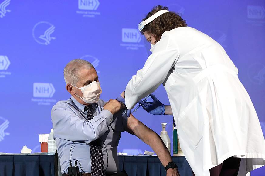 Dr. Anthony Fauci, Director of the National Institute of Allergy and Infectious Diseases, receives the Moderna COVID-19 vaccine at the HHS/NIH COVID-19 Vaccine Kick-Off event