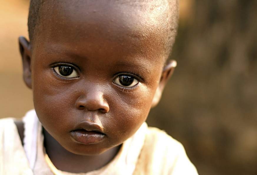 Close-up of an African boy looking at the camera.