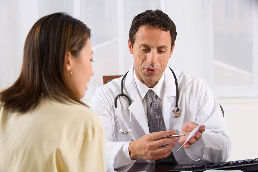 Doctor talking to a patient.