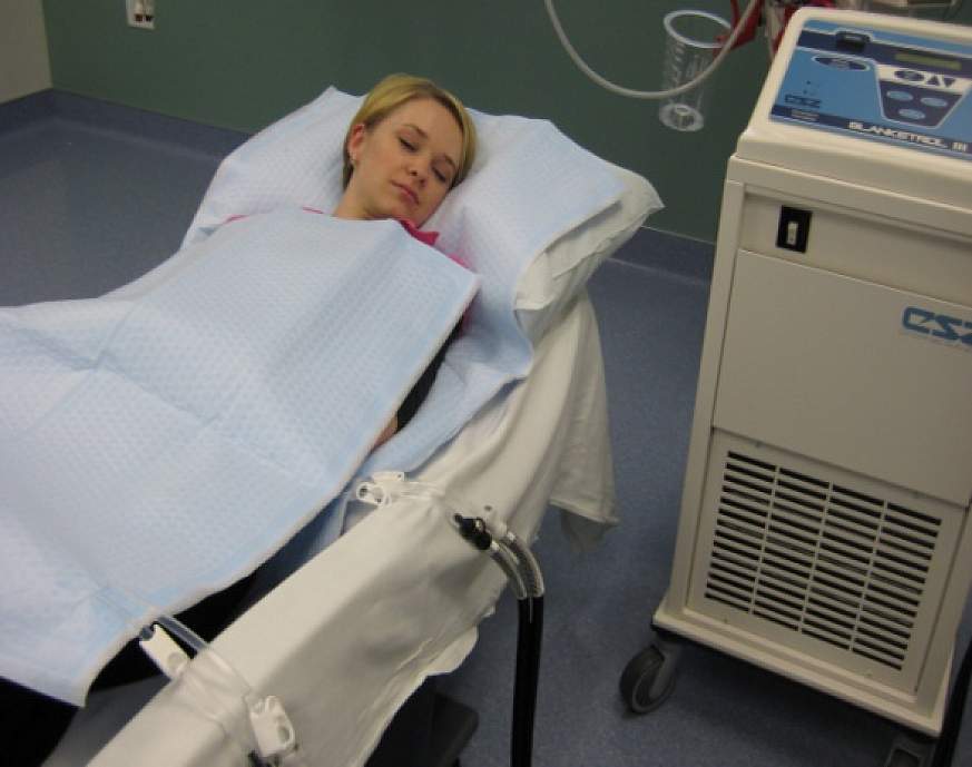 Woman lying on a Blanketrol mattress.