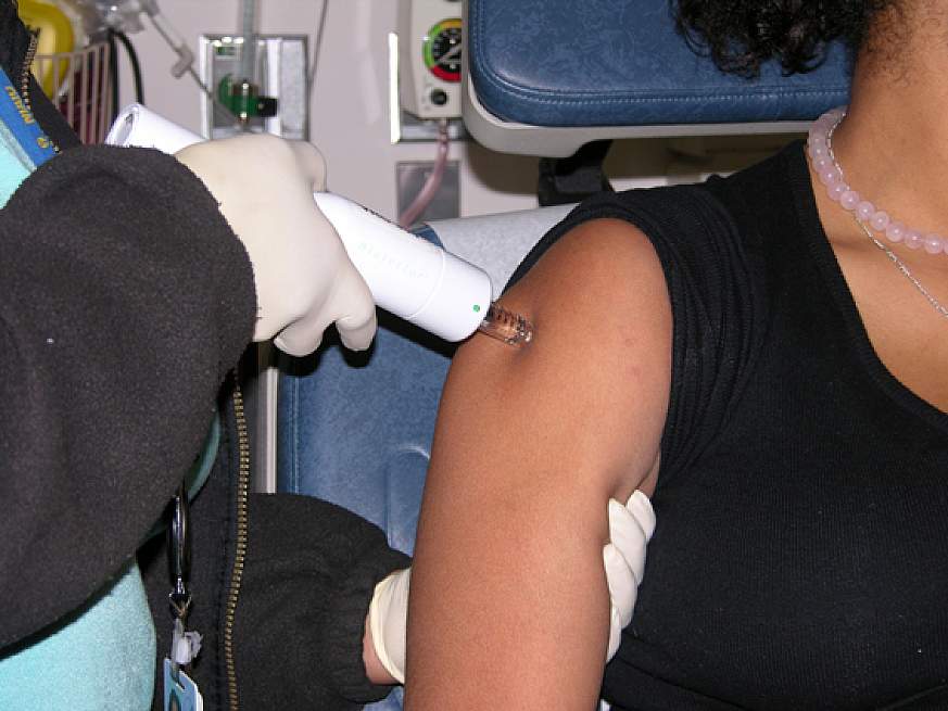 Volunteer receives a DNA vaccine.