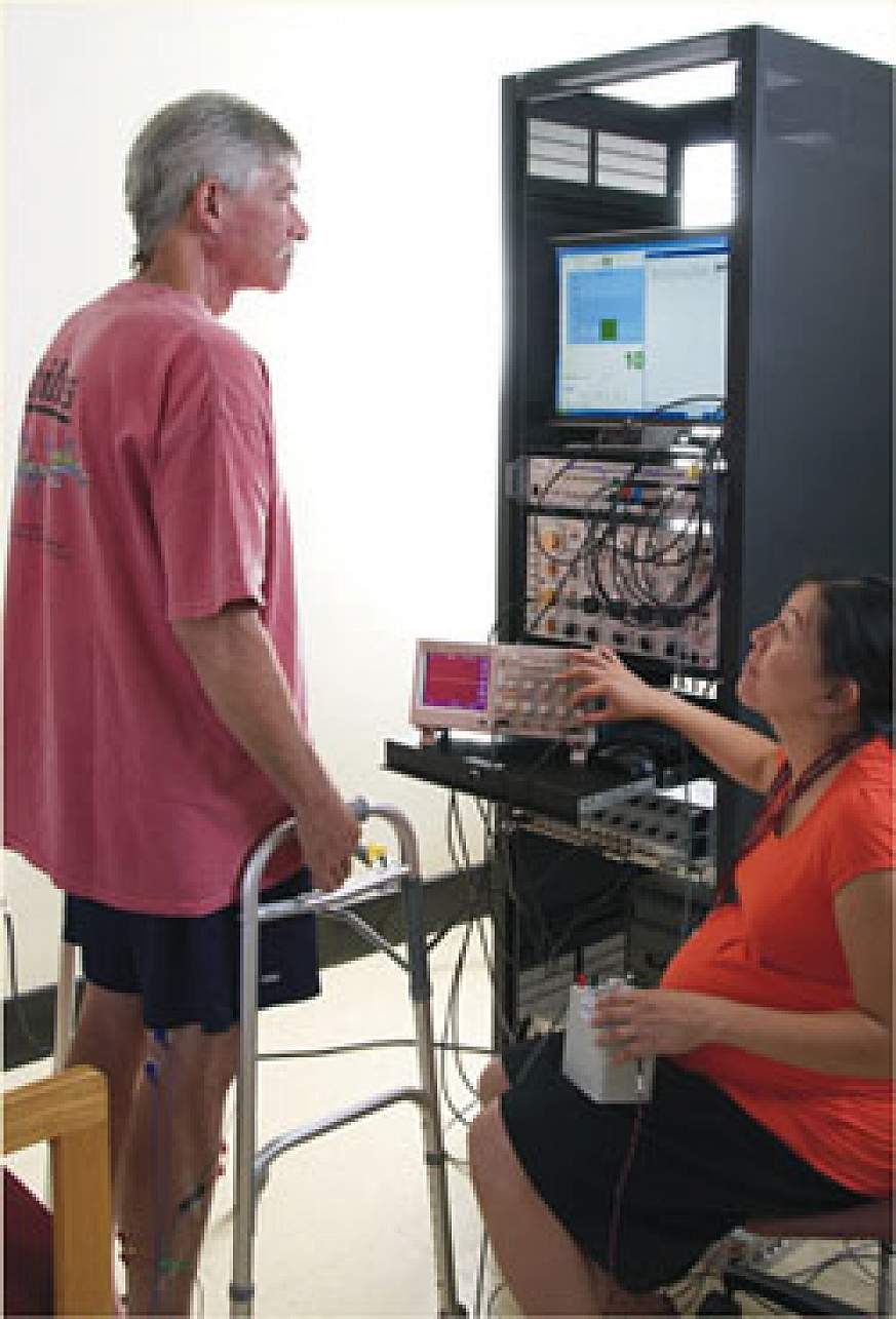 A man with an incomplete spinal injury learning to adjust his reflexes.
