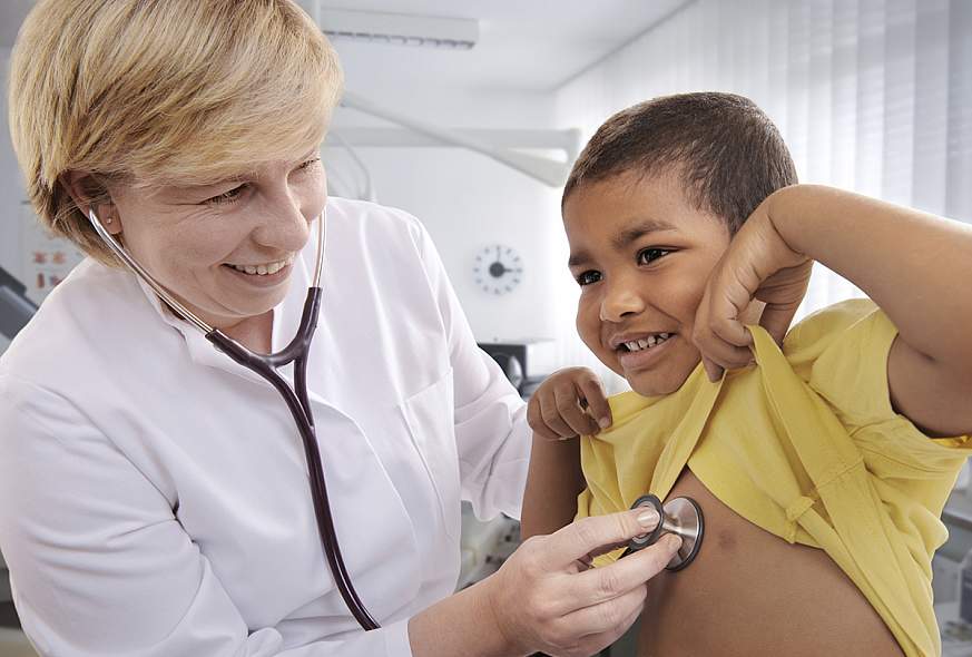 Image of a boy getting a chest exam