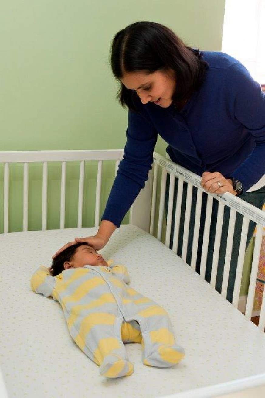 Woman with a sleeping baby