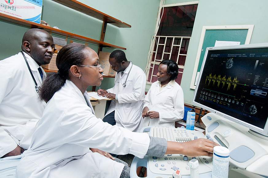 Image of researchers viewing data on a computer