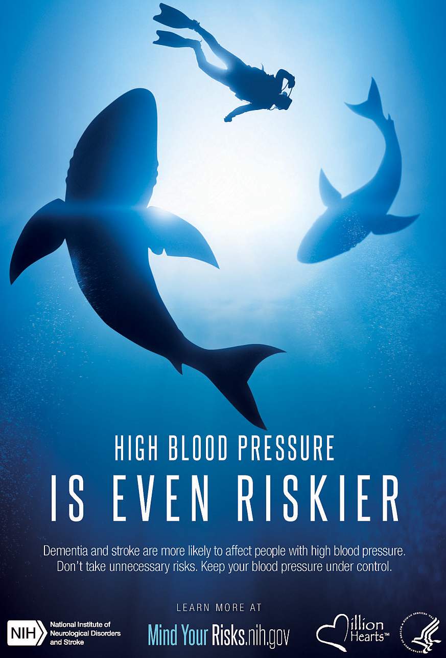 Image of sharks circling a swimmer.