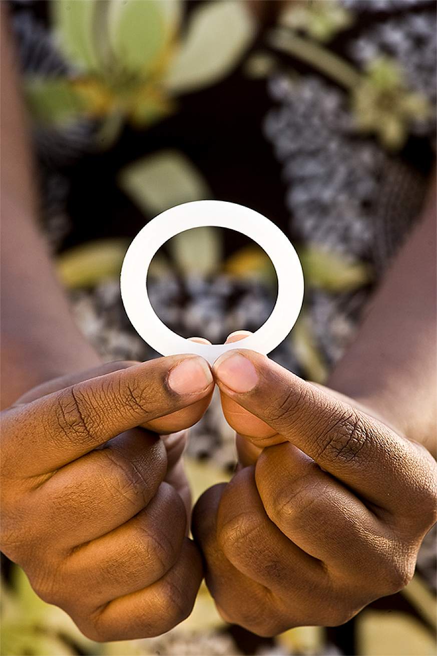 Woman holding the dapivirine vaginal ring tested in the NIH-funded ASPIRE study. 