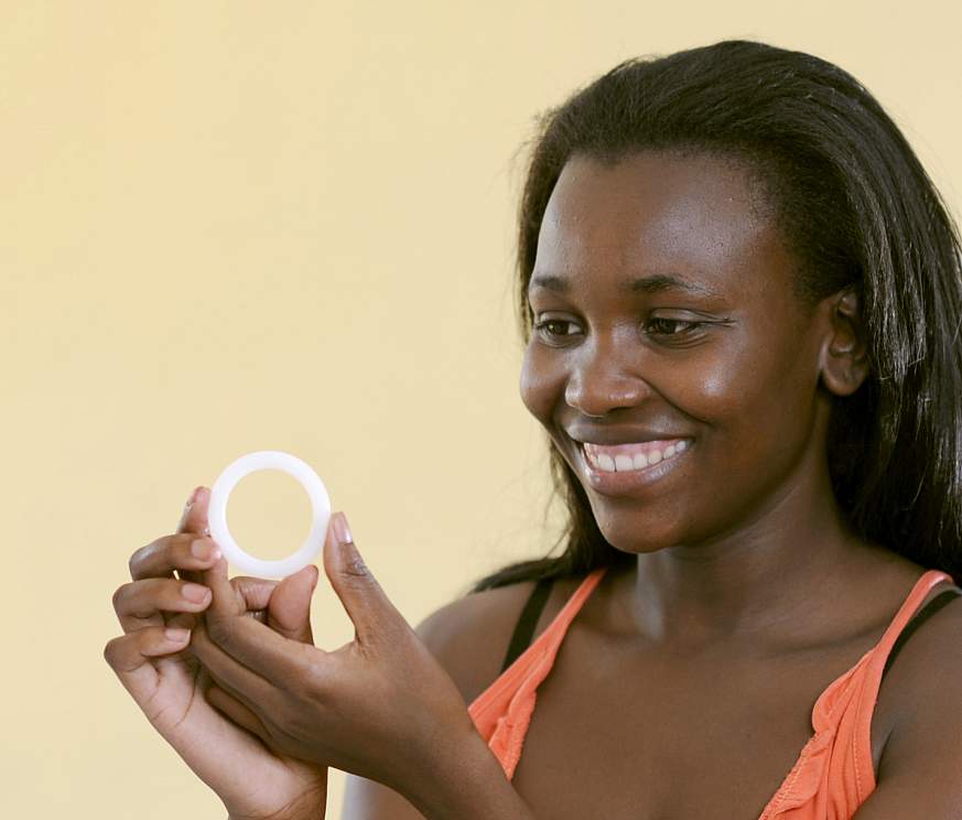 Image of woman holding the dapivirine vaginal ring