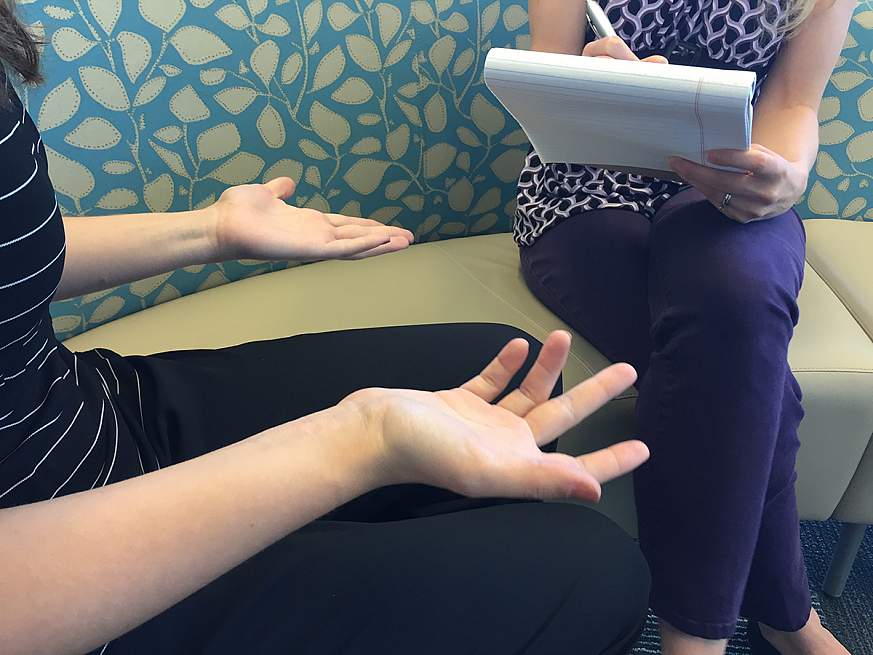 Image of two women talking