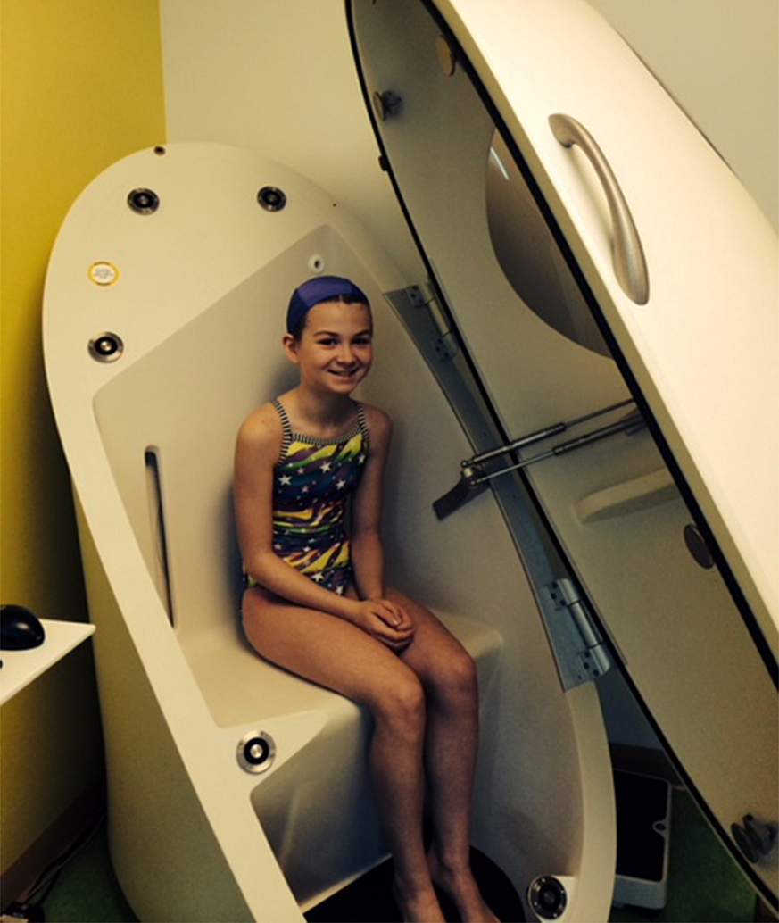 Image of a study participant in body composition measurement pod