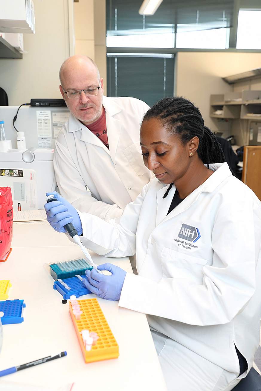 Image of two scientists in a lab.