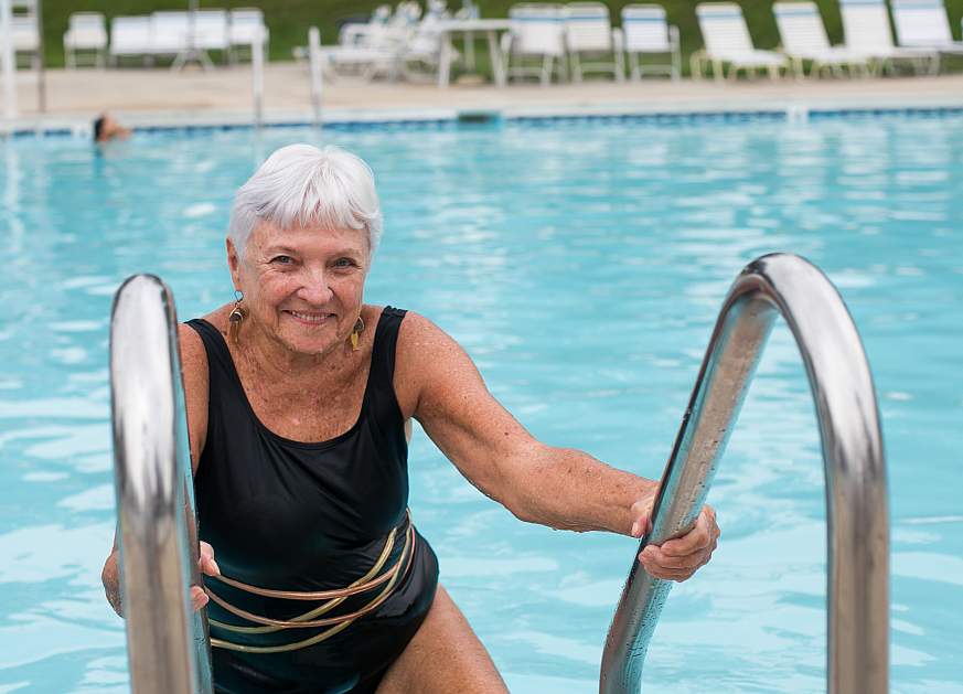 woman getting out of the pool