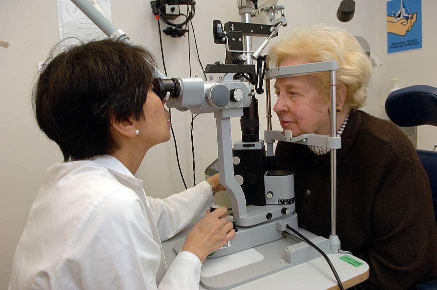 Image of a doctor performing an eye exam