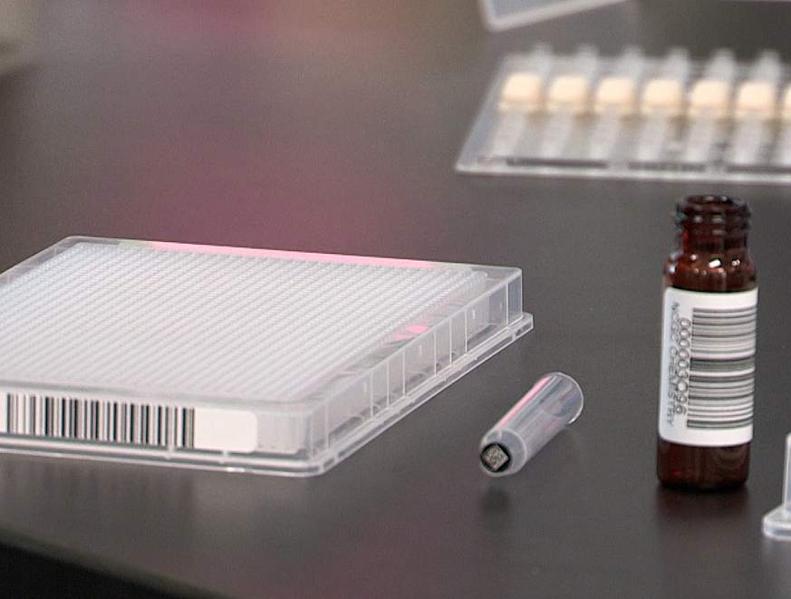 Enzyme containers on a scientific workbench