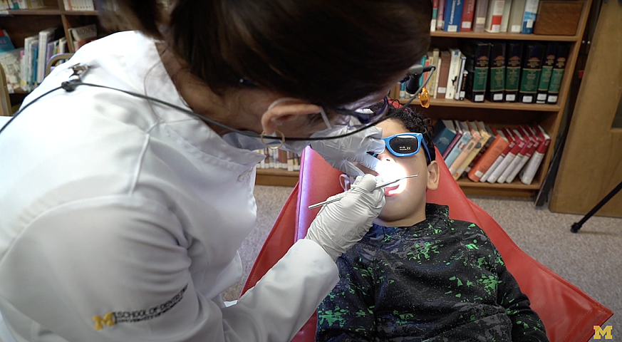 Image of a child receiving a dental exam