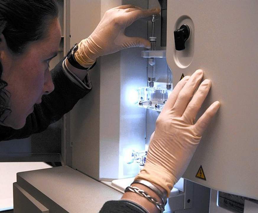 Researcher with a DNA sequencer.