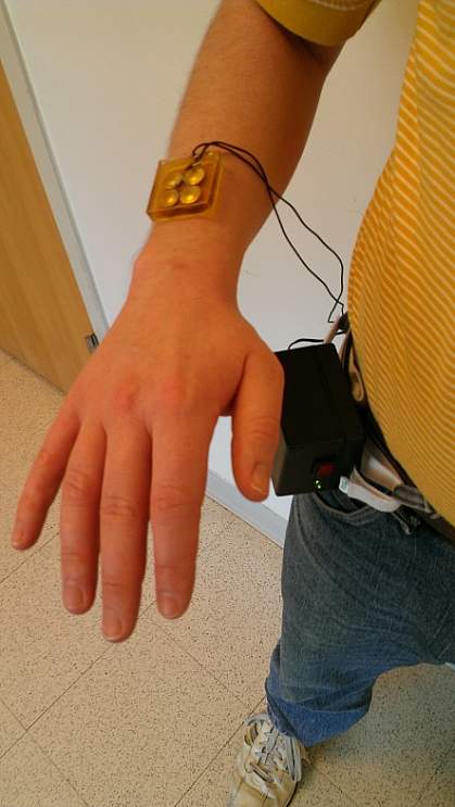 Image of a person wearing the therapeutic ultrasound patch