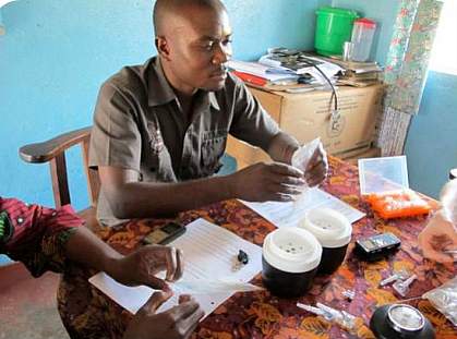 Photo of Zambian health care worker testing NINA prototype